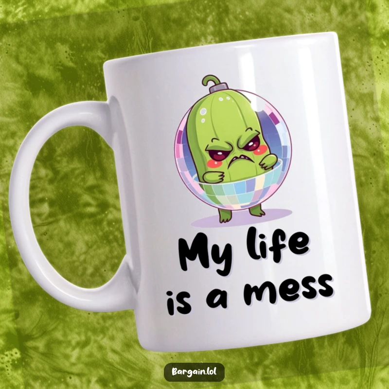 Funny mug with a grumpy pickle stuck inside a sparkling disco ball, showcasing its hilarious predicament and party vibe.