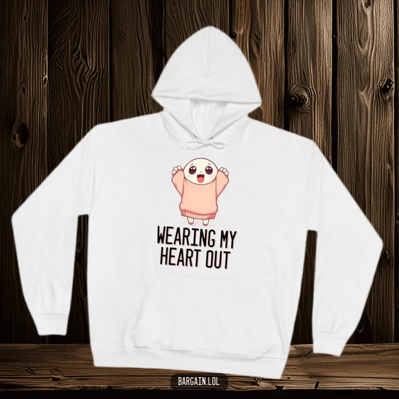 Funny round character ecstatically holding a tattered, oversized sweater, designed for warmth and humor on a cozy hoodie.