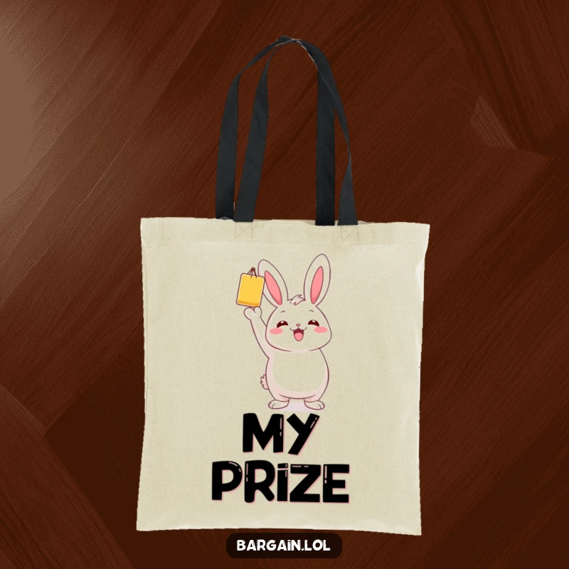 Funny tote bag illustrated with a chubby bunny character proudly holding a colorful bargain item.